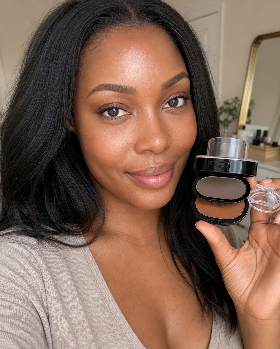 Woman holding the Beauty Britain Natural Eyebrows powder kit