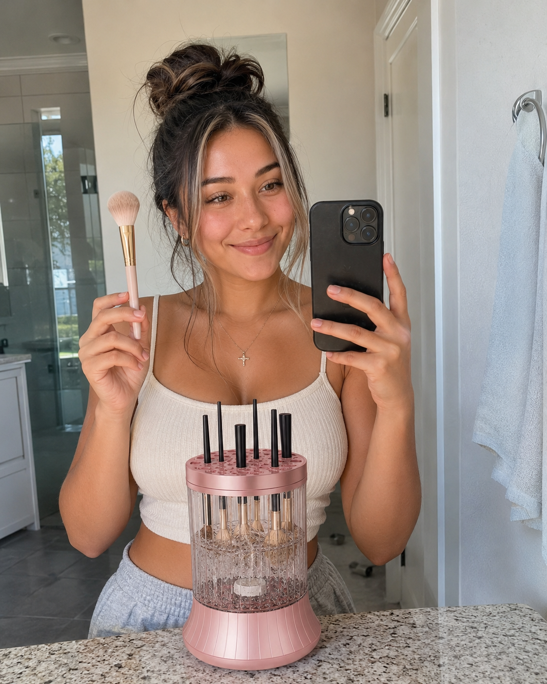Electric Makeup Brush Cleaner in action with a makeup brush