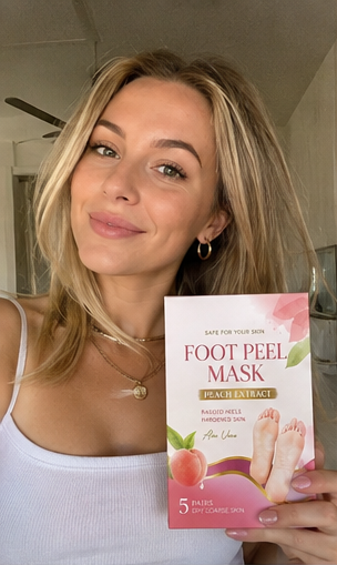 Customer showing smooth feet after using the Foot Peel Mask